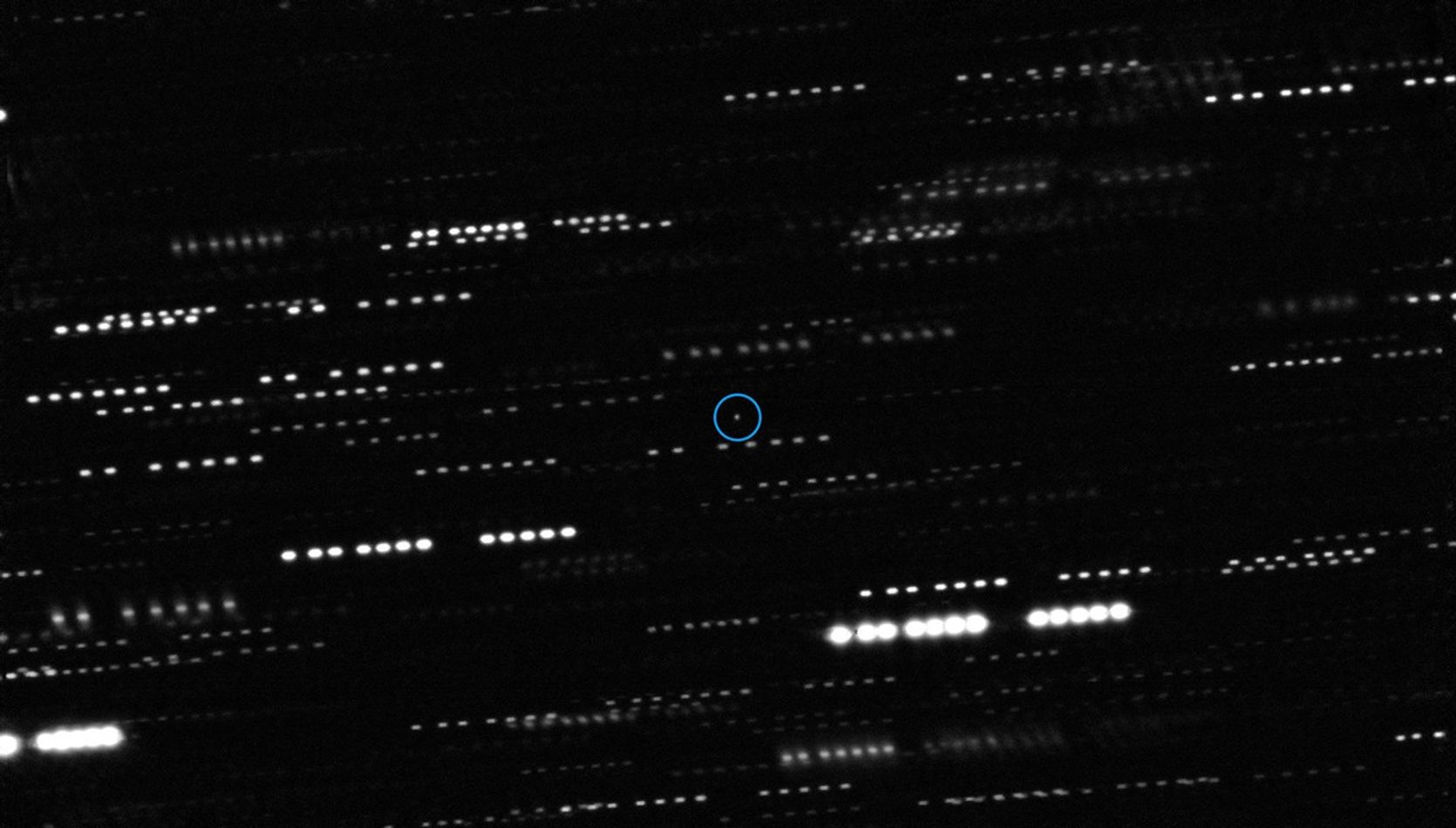 The interstellar object ‘Oumuamua is at the center of this image and circled in blue The interstellar object ‘Oumuamua is at the center of this image and circled in blue