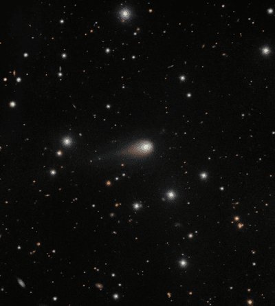 The photo shows the comet and its tail in front of many background stars