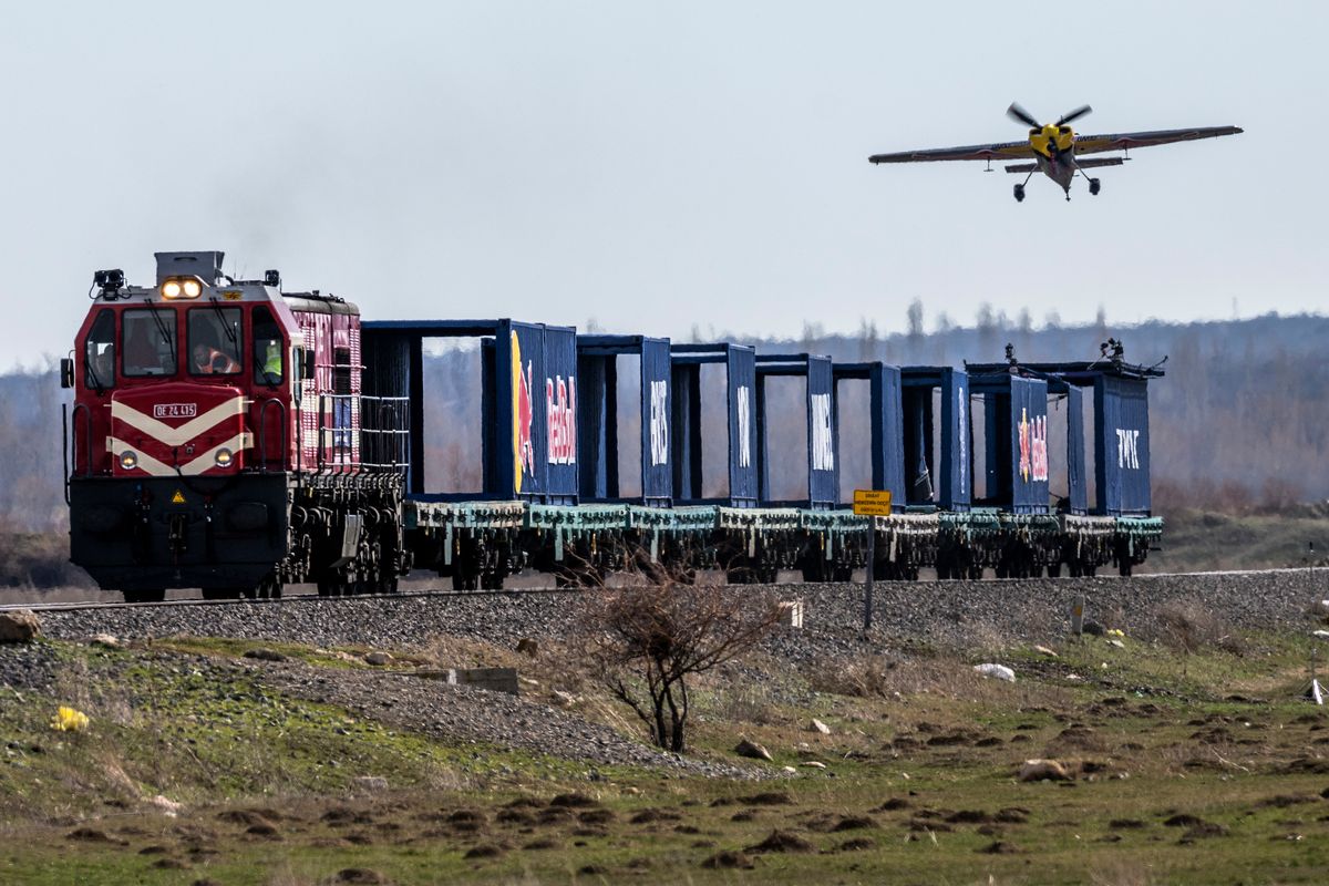 Red Bull Pilot Lands On A Moving Train At 120 Kilometers Per Hour, In Daring World First