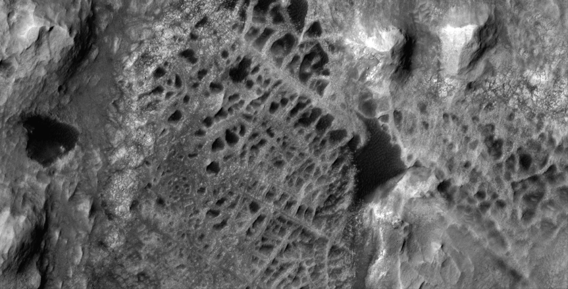 A black & white photo showing the peculiar geological structures as seen from space. A black & white photo showing the peculiar geological structures as seen from space.