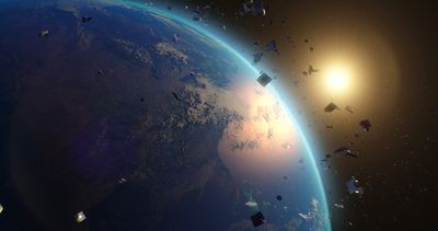 artist impression of broken satellites around Earth.