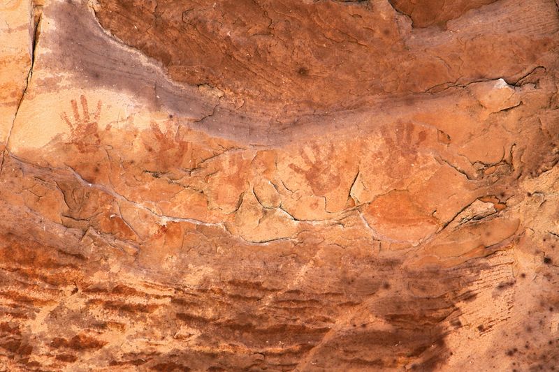 Prehistoric handprints on cave wall
