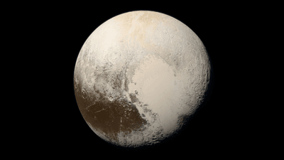 An image of pluto, its famous heart in the foreground.