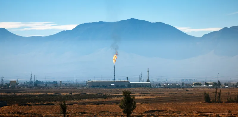 An industrial facility in Iran against the backdrop of mountains