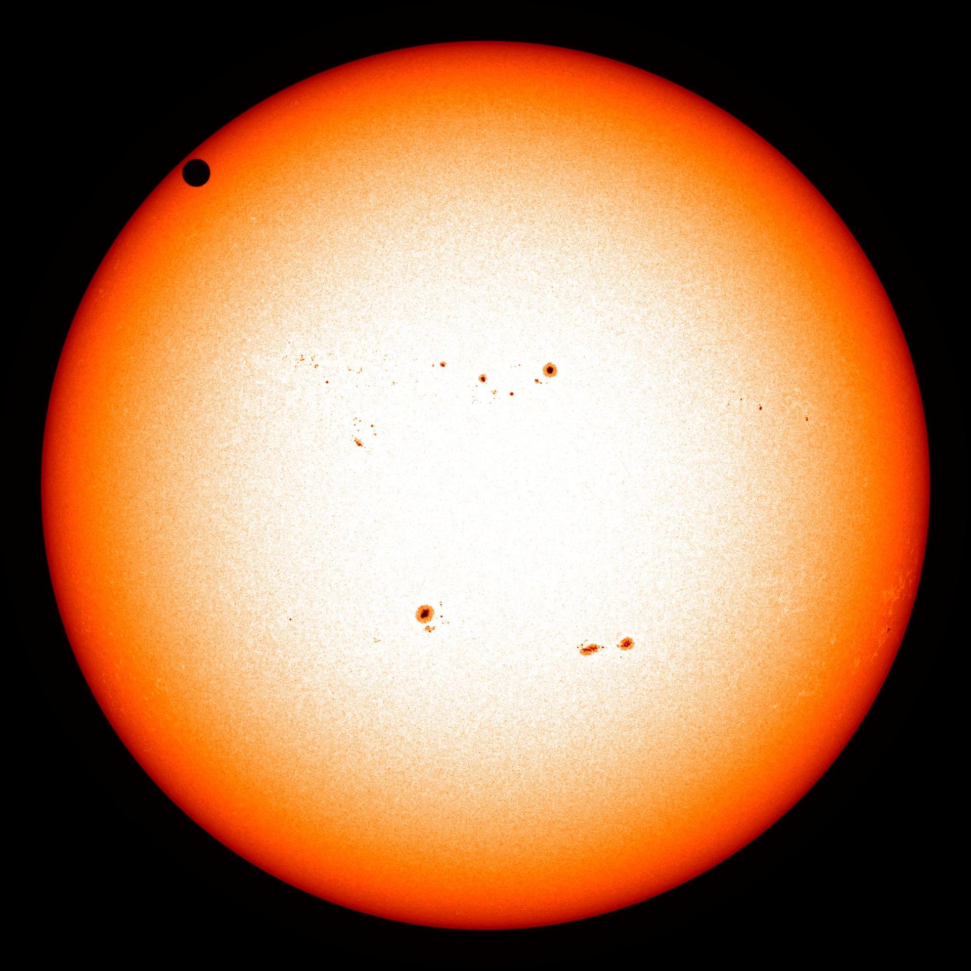 The 2012 Transit of Venus as seen by Solar Dynamics Observatory. The Earth transiting from Mars would look similar.