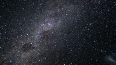 The central band of the Milky way and countless stars are visible in this photo from deep space