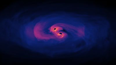 Nasa image of a simulation showing the merger of two supermassive black holes.