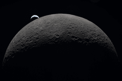 If you can tear your eyes off the crescent Earth in this photo, you will see how the far side of the Moon is lacking in seas, but why?