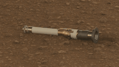 A sample tube left on the Martian surface by NASA's Perseverance rover.