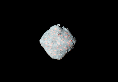 a picture of ryugu filled with red flares representing the impacts