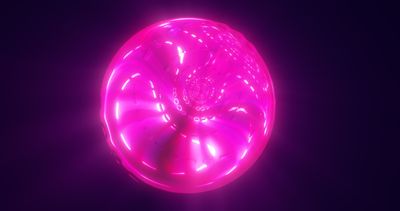 A pink bubble with glowing clusters insideand other bubbles