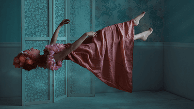 A woman floating in a dream.