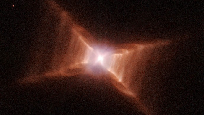 The red nebula us shaped like two ladders crossing The red nebula us shaped like two ladders crossing