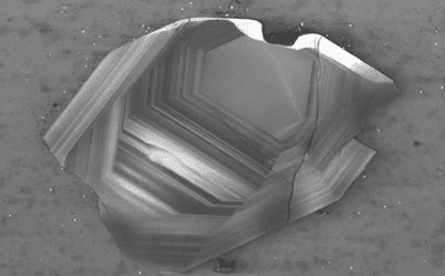 A Jack Hills zircon around 200 micrometers across. Not only are these the oldest surviving crystals on the planet, they contain clues to what was there even before them.