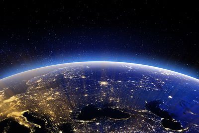 Eastern Europe as viewed from space at night with lots of yellow light concentrated in urban places