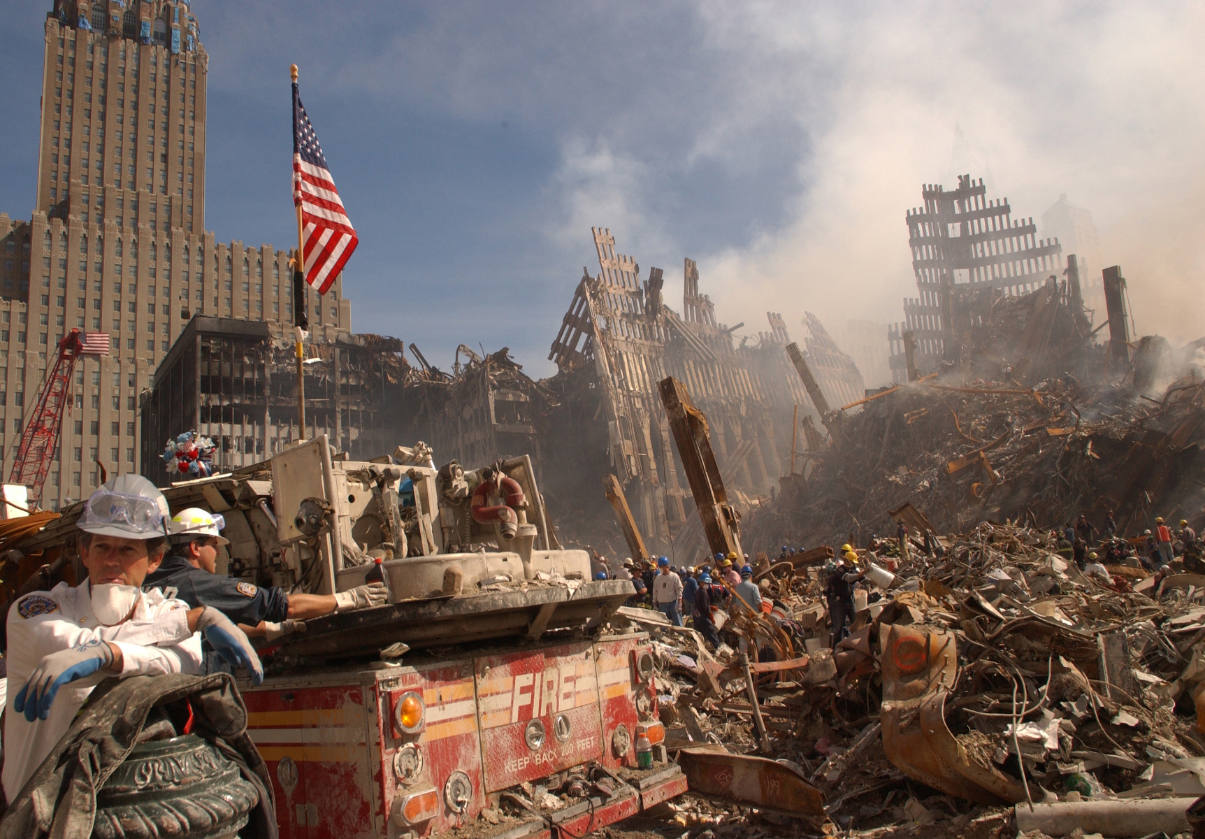  Urban Search and Rescue teams inspect the wreckage at the World Trade Center.