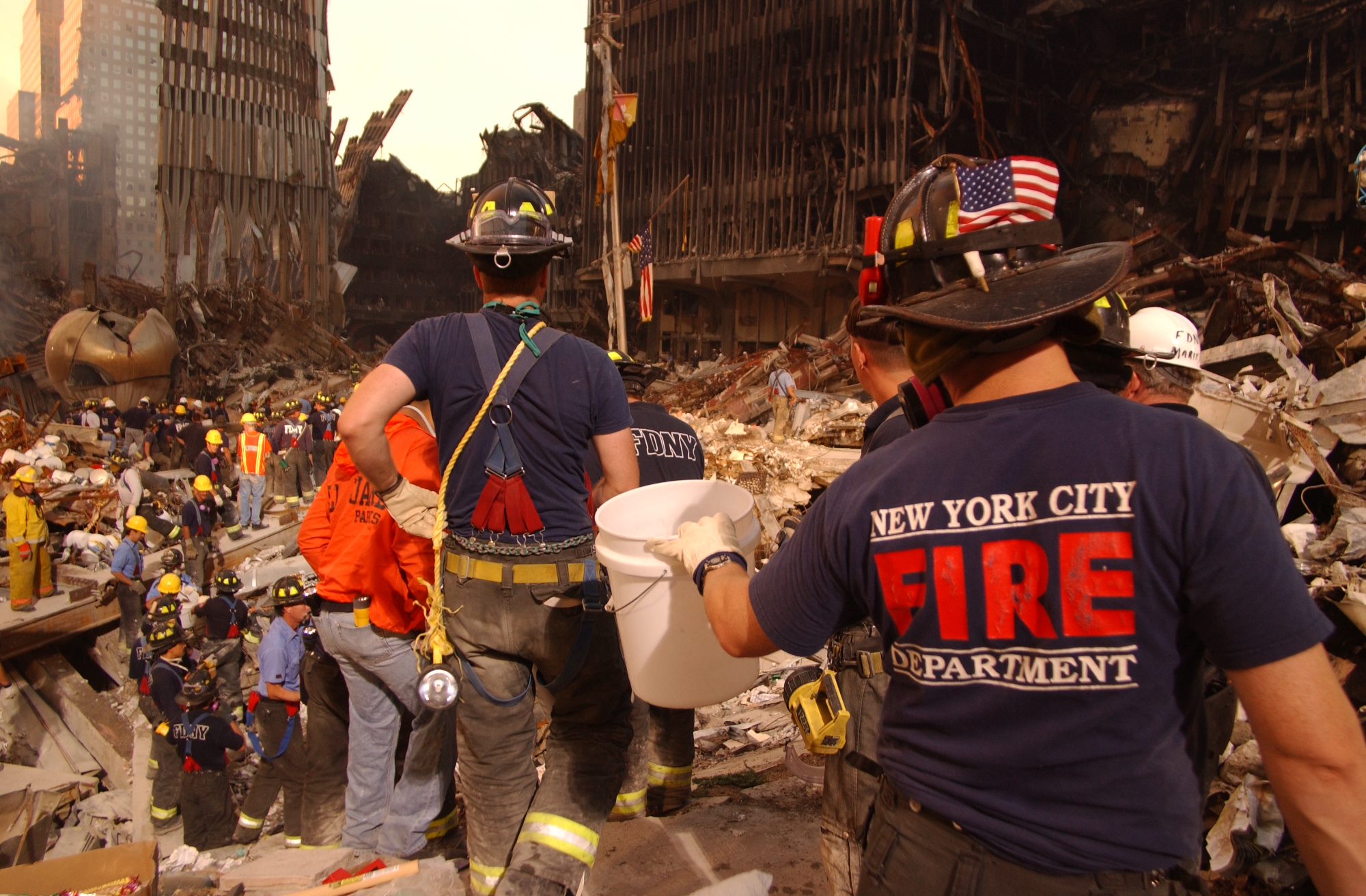 New York City fire fighters search for survivors at Ground Zero.