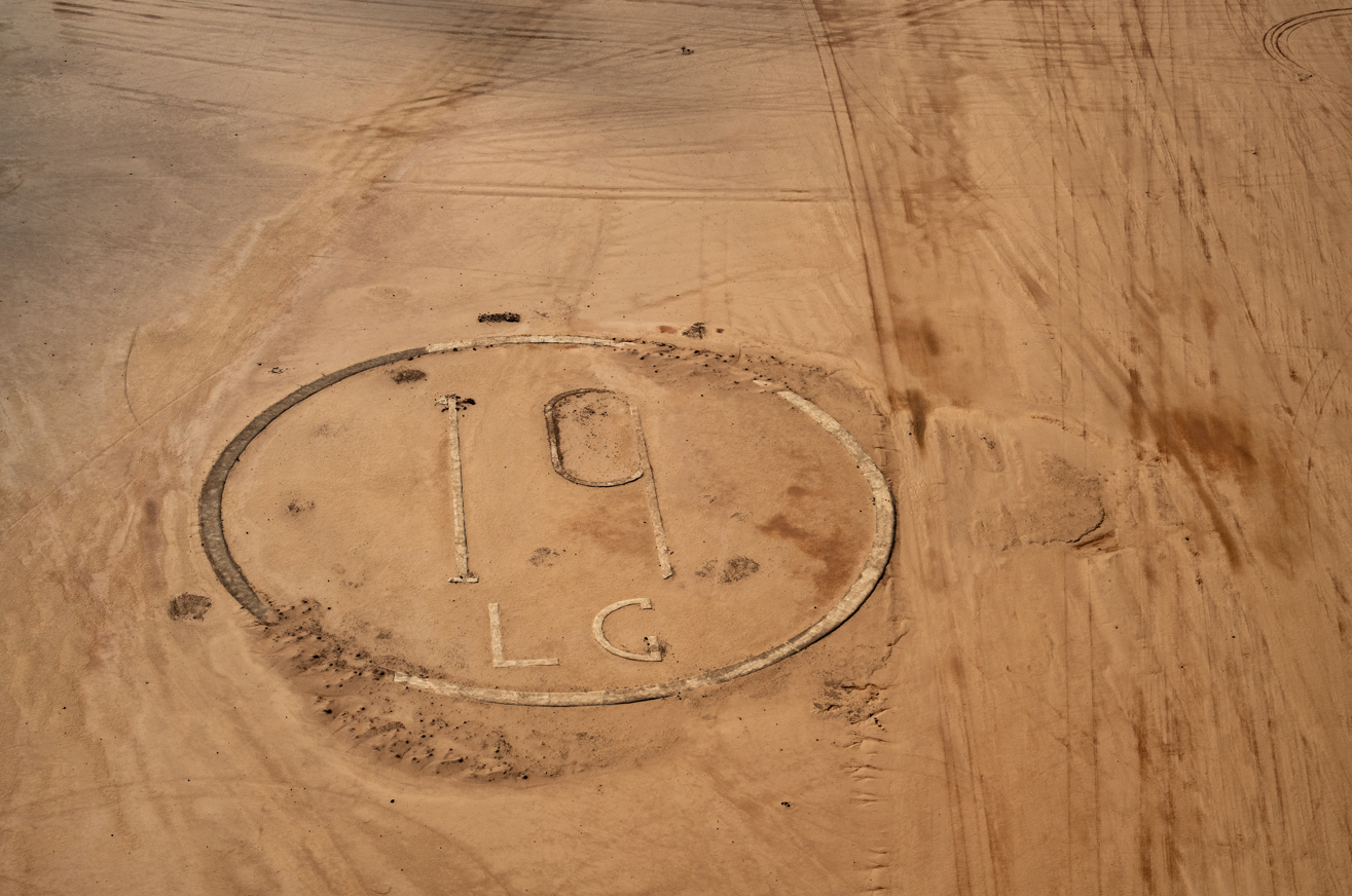 Shahba Landing Ground 19: a giant circle and number in the desert