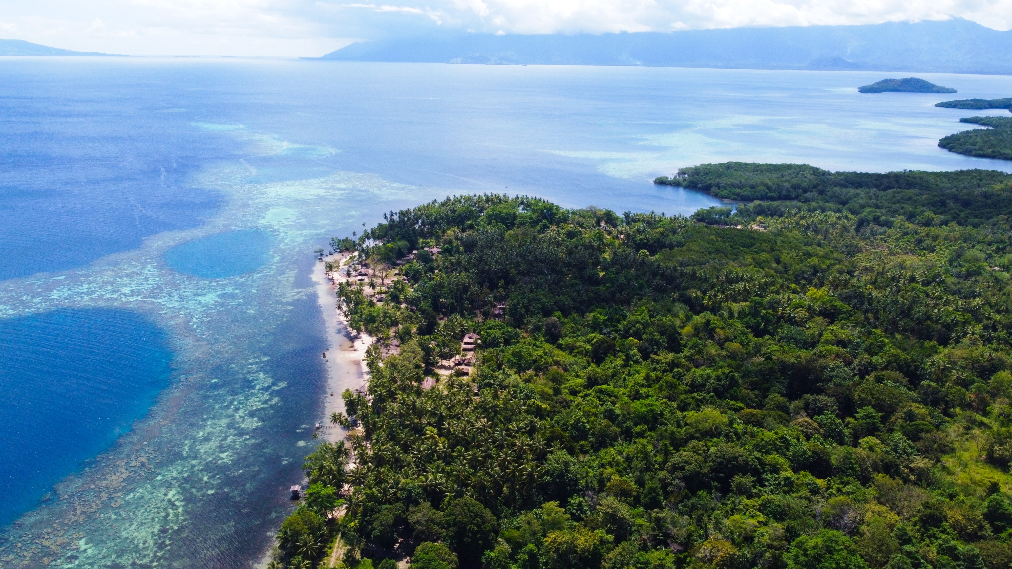 An aerial shot of Milne Bay in Papua New Guinea An aerial shot of Milne Bay in Papua New Guinea