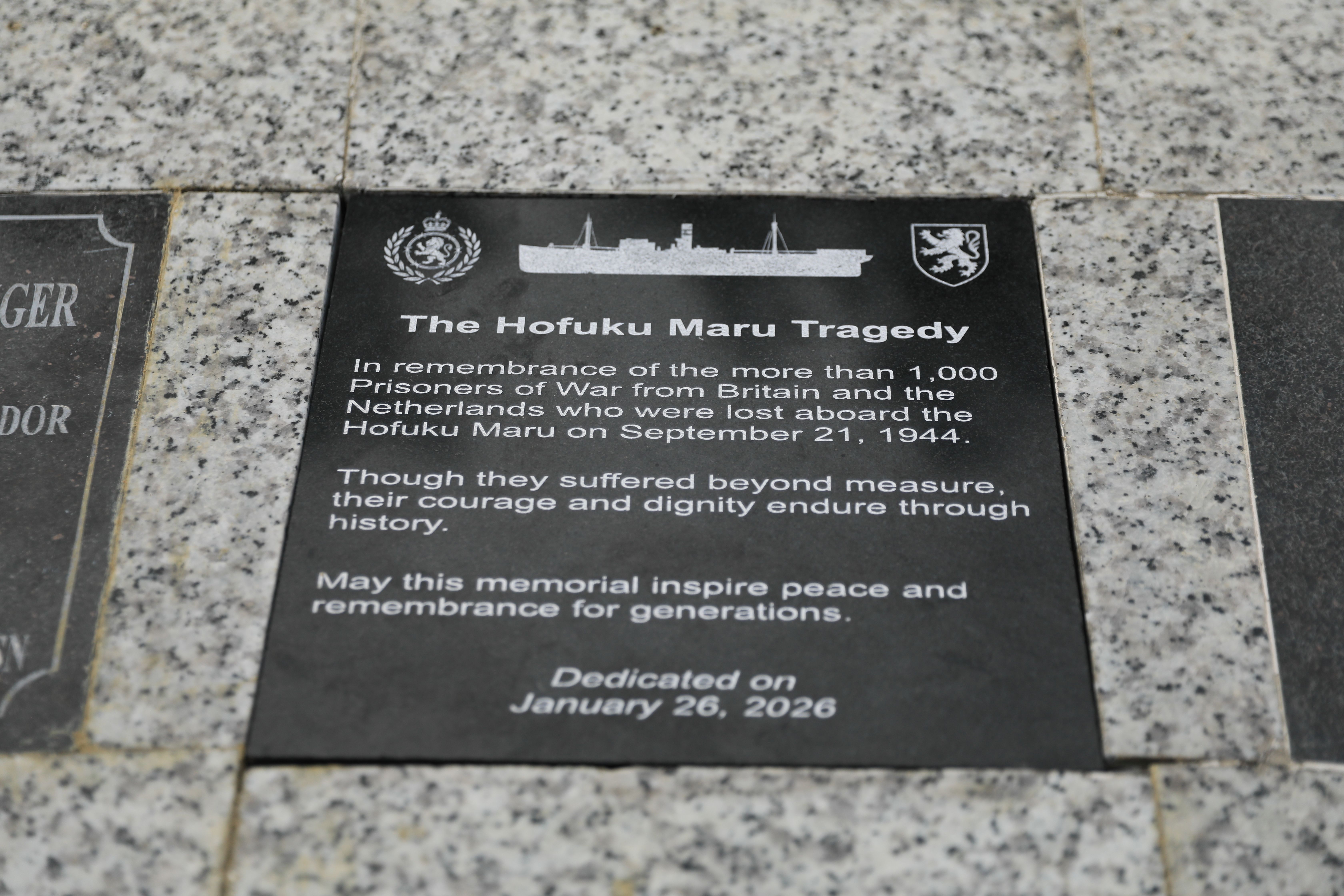 Plaque dedicated to the POWs who died aboard the Hofuku Maru from the Hellships Memorial, Subic Bay, Philippines. Plaque dedicated to the POWs who died aboard the Hofuku Maru from the Hellships Memorial, Subic Bay, Philippines.