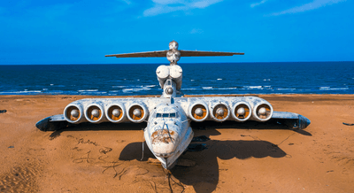 An old Lun-class ekranoplan – a strange hybrid vehicle that combines a boat's hull with an aeroplane's wings to glide over water – sits on the shores of the Caspian Sea in Kaspiysk, Dagestan, Russia.