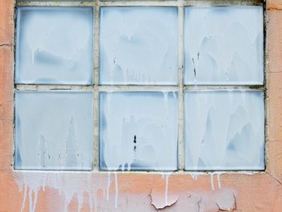 Window covered in white paint
