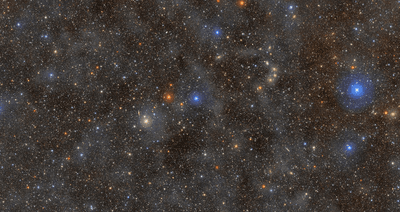 a few bright blue stars and a few red and white and then a truly countless background field filled with pinprick of light