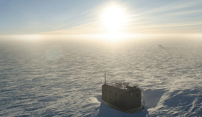 That's a lot of ice: The sun hovers just above the horizon at the South Pole Atmospheric Research Observatory in the depths of Antarctica.