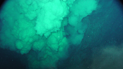 A giant smoky plume under the water.