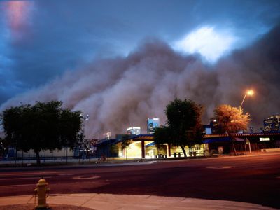 A dust storm looms over Phoenix, Arizona. It looks like the end of the world is oncoming.