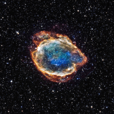 colourful wispy circular layer of gas are the left over material from the supernova explosion