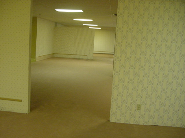 The original "Backrooms" image was posted on 4chan in 2011. In 2024, it was ourced to a real furniture store in Wisconsin.