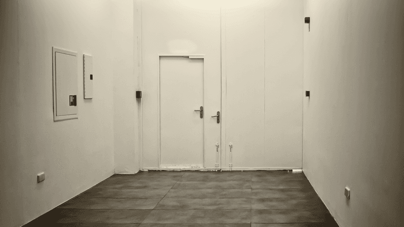 a white room with plain walls