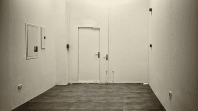 a white room with plain walls
