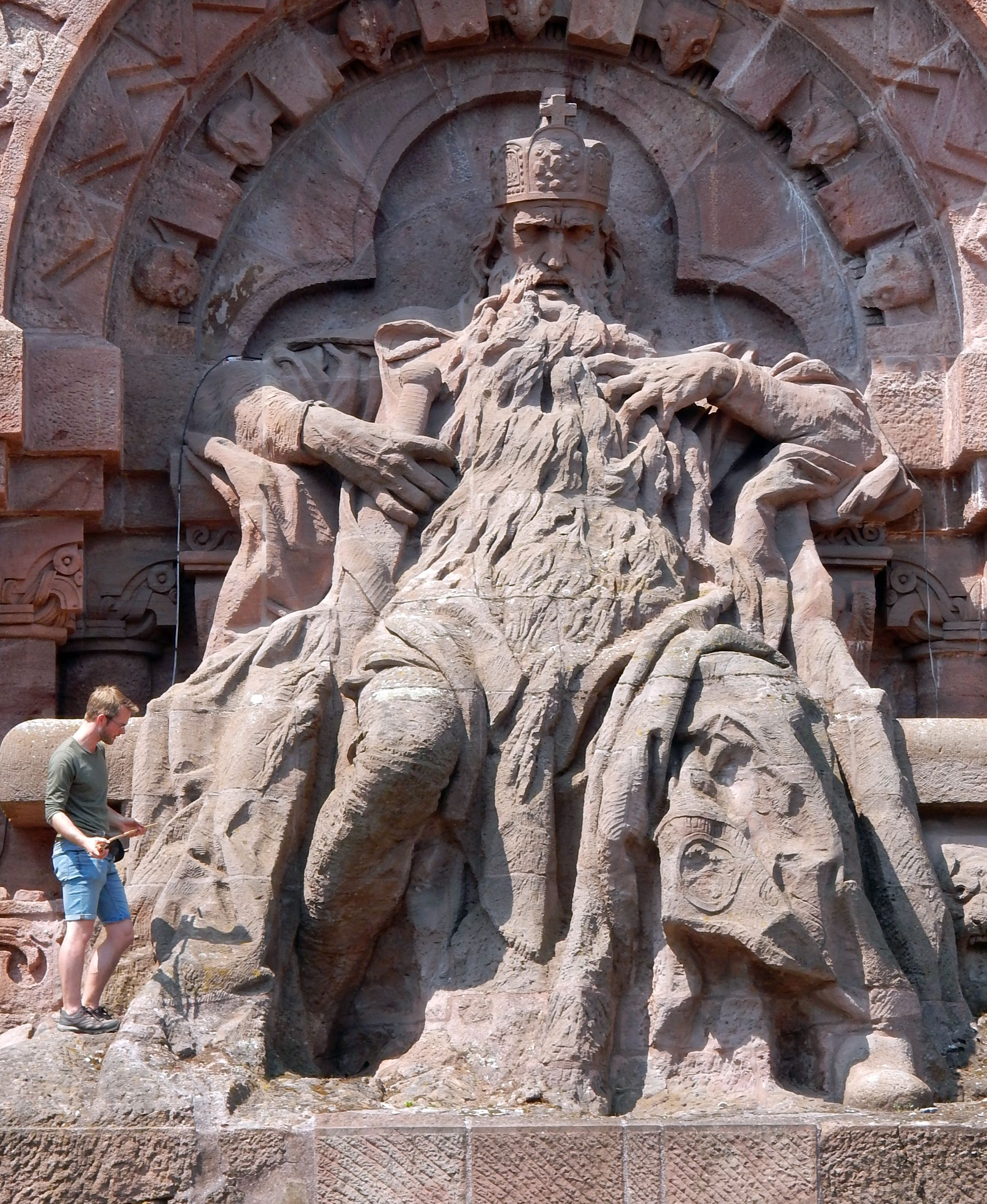 Dr Steffen Trümper searching for silicified wood in front of the at the Kyffhäuser Monument, a statue of the Staufer Emperor Frederick ‘Barbarossa’ Dr Steffen Trümper searching for silicified wood in front of the at the Kyffhäuser Monument, a statue of the Staufer Emperor Frederick ‘Barbarossa’
