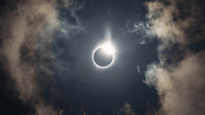 the sun's light is being almost totally blocked by the moon