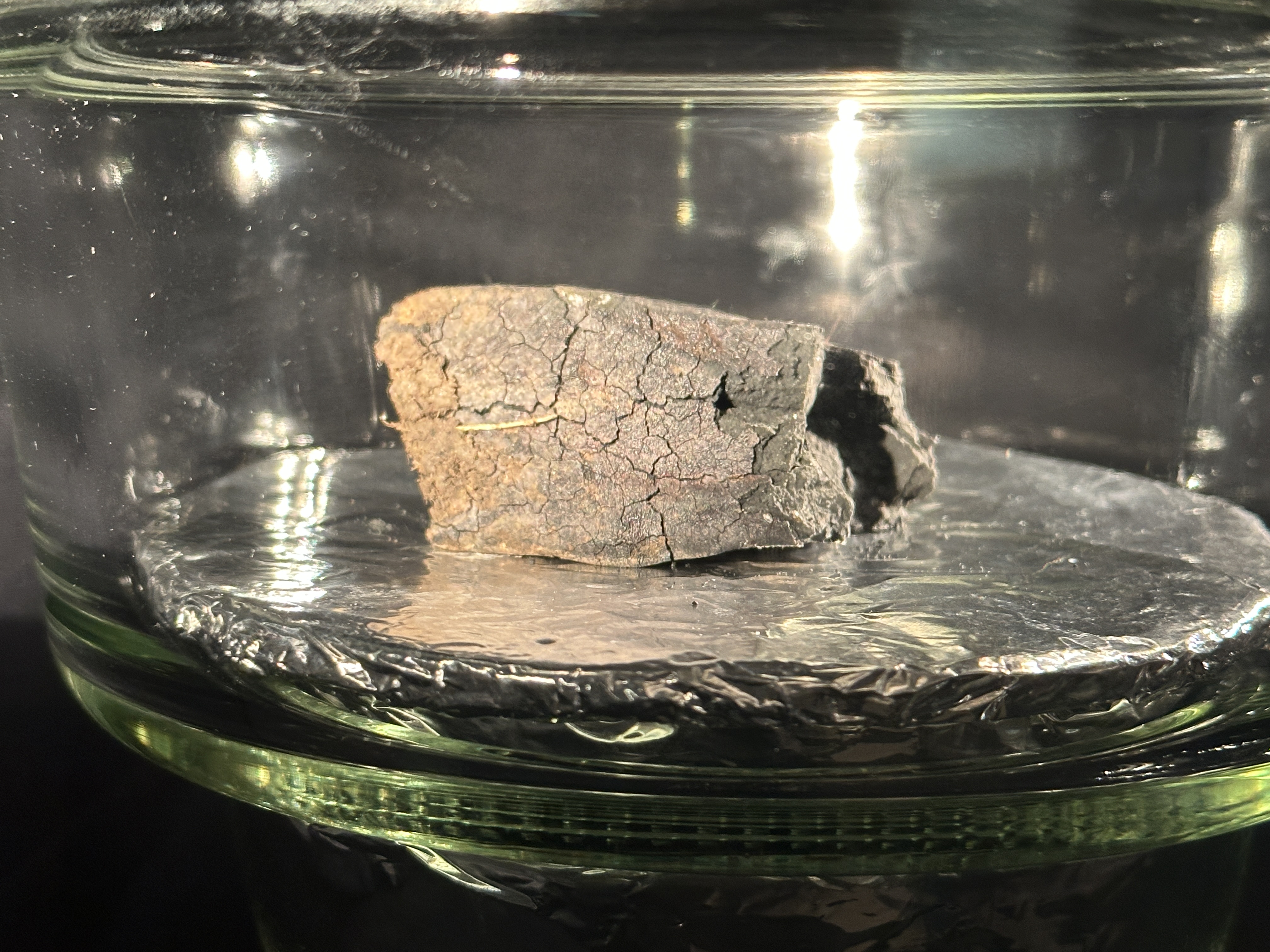 A piece of the winchcombe meteorite on display. A piece of the winchcombe meteorite on display.
