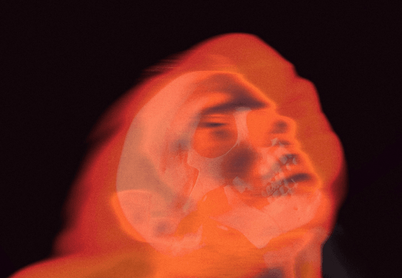 a mysterious abtract human face, with red coloring
