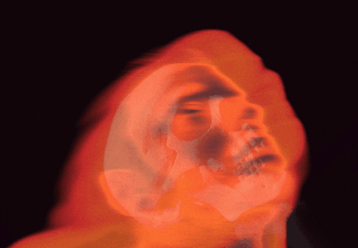 a mysterious abtract human face, with red coloring
