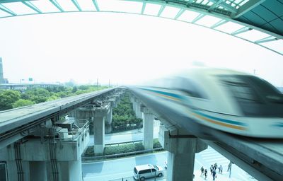A non-record-breaking Maglev train zips out of a station in Shangai, China