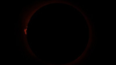 the sun is completely covered by the Moon and the light is visible only at the edge