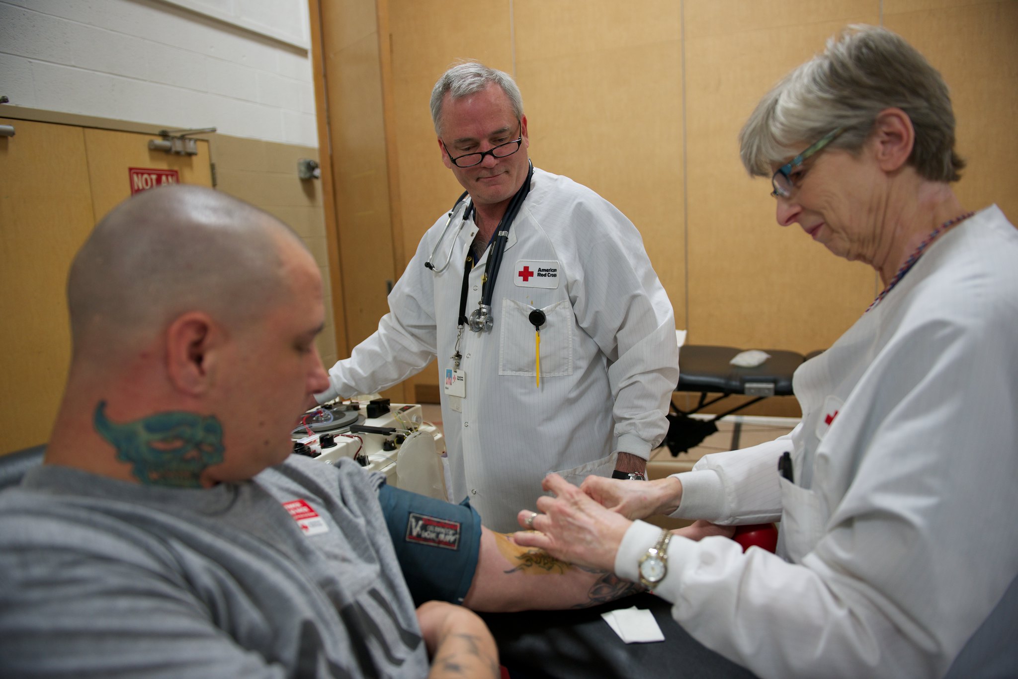A donor gives blood at an American Red Cross blood drive in Minnesota.