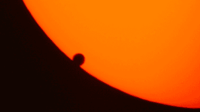 This photograph taken during the Transit of Venus in 2004 shows the black drop effect, with the area of darkness appearing to bulge out where Venus's touches the edge of the Sun