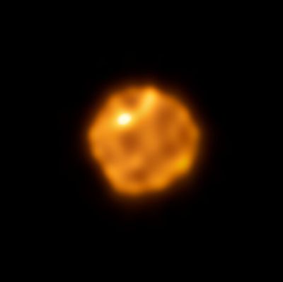 the star is roughly circular but lumpy. two bright region are visible compared to the rest