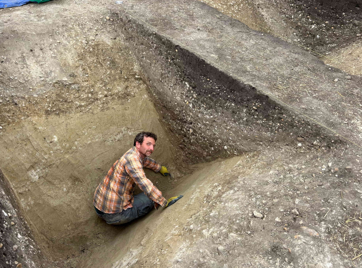 An archeologist working at the site near Cherlby in the Central Bohemian Region of the Czech Republic. An archeologist working at the site near Cherlby in the Central Bohemian Region of the Czech Republic.