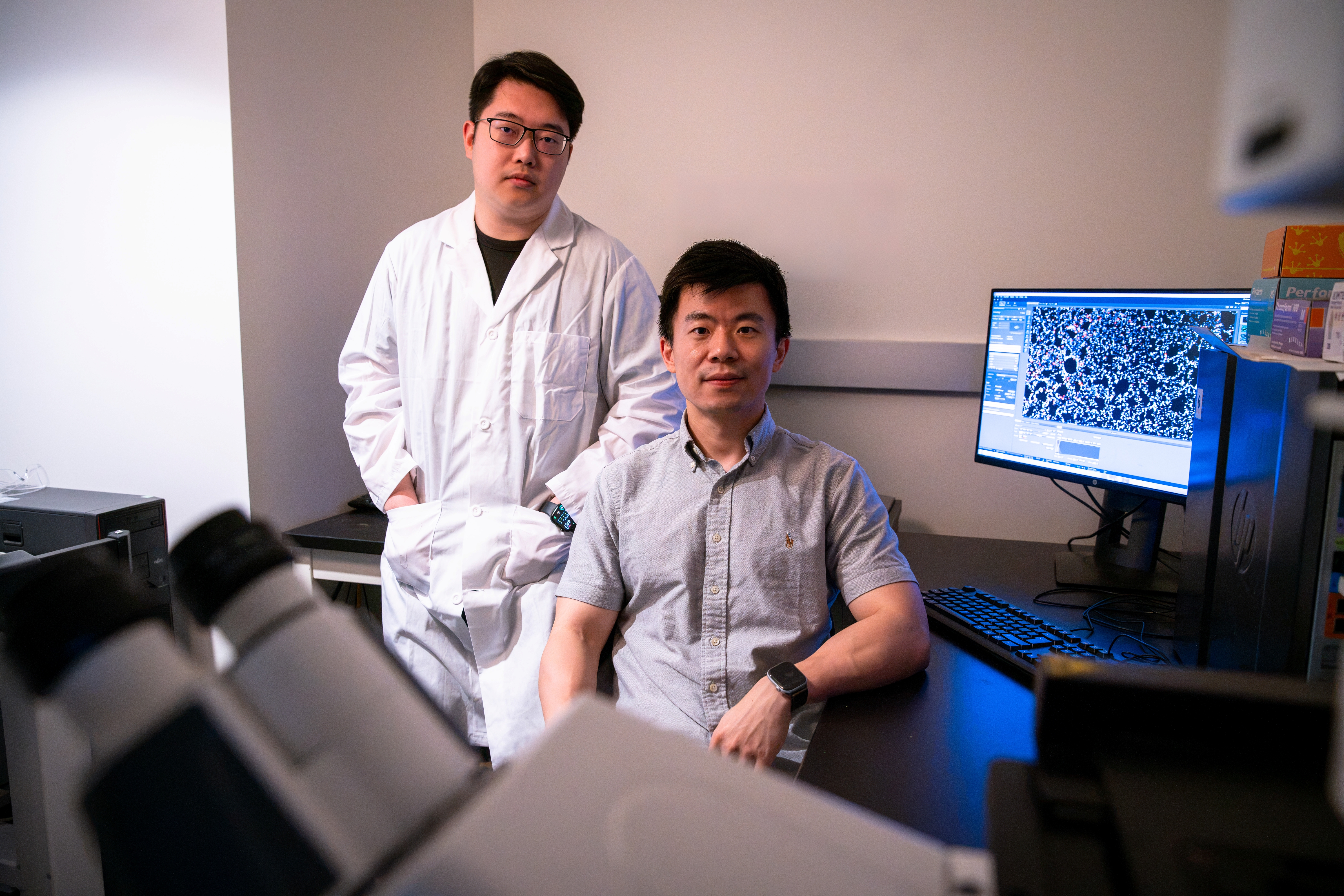 Associate Professor Bowen Li and PhD Candidate Jingan (Charles) Chen pictured in the Li Lab at the Leslie Dan Faculty of Pharmacy, University of Toronto. Associate Professor Bowen Li and PhD Candidate Jingan (Charles) Chen pictured in the Li Lab at the Leslie Dan Faculty of Pharmacy, University of Toronto.