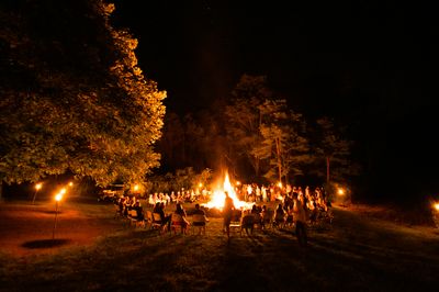 People gathered around a campfire