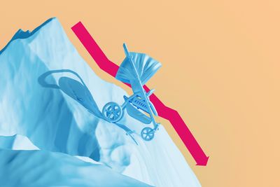 An illustration of a push chair going down a slope with a downward trending graph behind it.