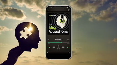 A hand holding up a silhouette of head with a puzzle piece-shaped hole in it, overlaid with a picture of a mobile phone showing the Big Questions logo.