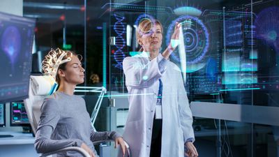 sci fi-inspired image of woman undergoing EEG with a female scientist looking at data on a see-through screen